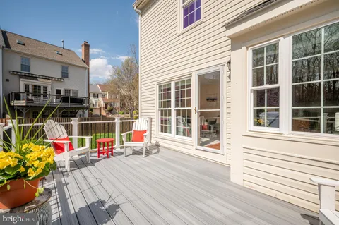 a view of living room with wooden floor and seating space