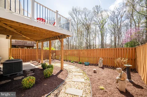 a patio with table and chairs