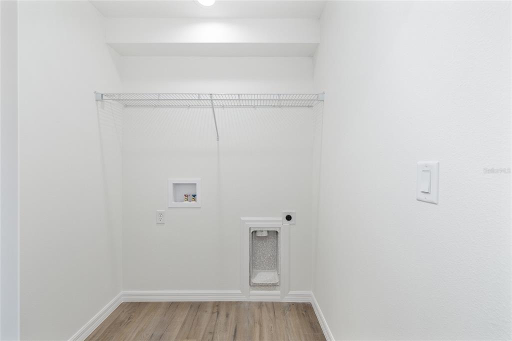 13031 Northeast 7th Loop Silver Springs, FL 34488 - Photo 29 of 34 a view of small space with racks on the wall