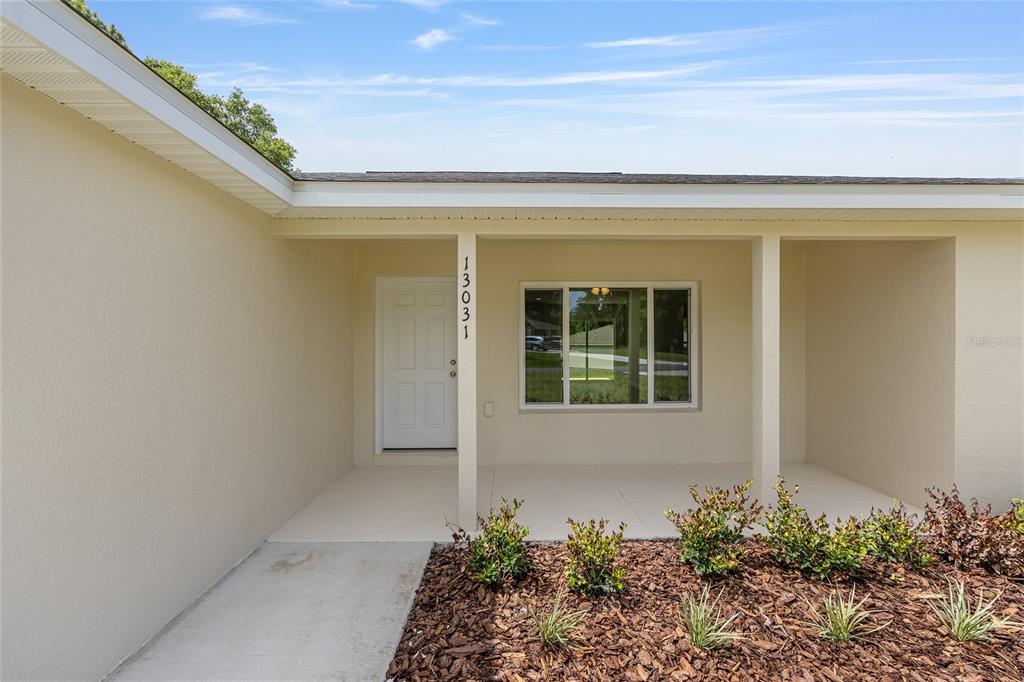 13031 Northeast 7th Loop Silver Springs, FL 34488 - Photo 6 of 34 a view of entrance