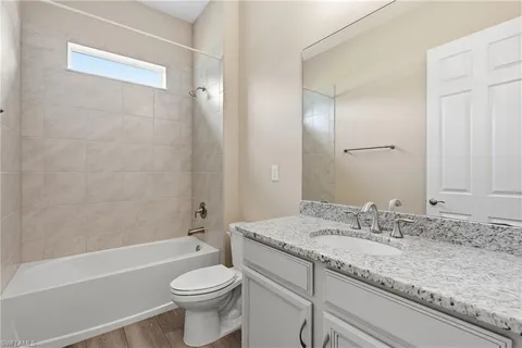 $885,000 | 10240 Avonleigh Drive, Bonita Springs, FL 34135