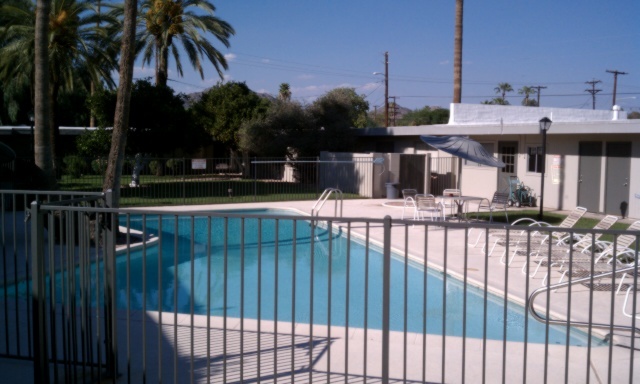 3242 East Camelback Road, Unit 108 Phoenix, AZ 85018 - Photo 1 of 13 a view of swimming pool from a balcony