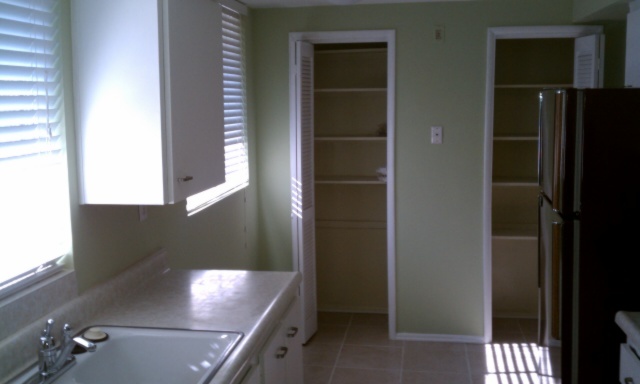 3242 East Camelback Road, Unit 108 Phoenix, AZ 85018 - Photo 3 of 13 view of a room that has a door and window in it