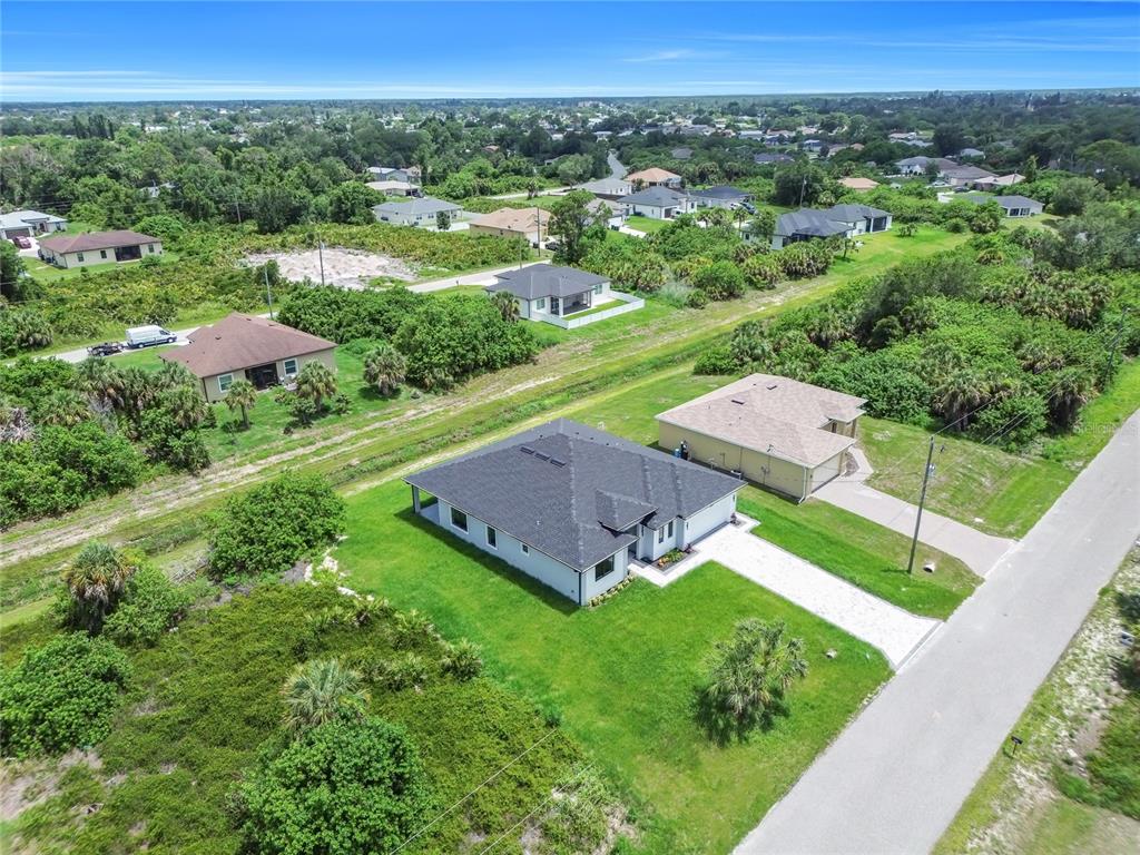 2328 Irondale Road North Port, FL 34287 - Photo 41 of 45 an aerial view of a house with yard