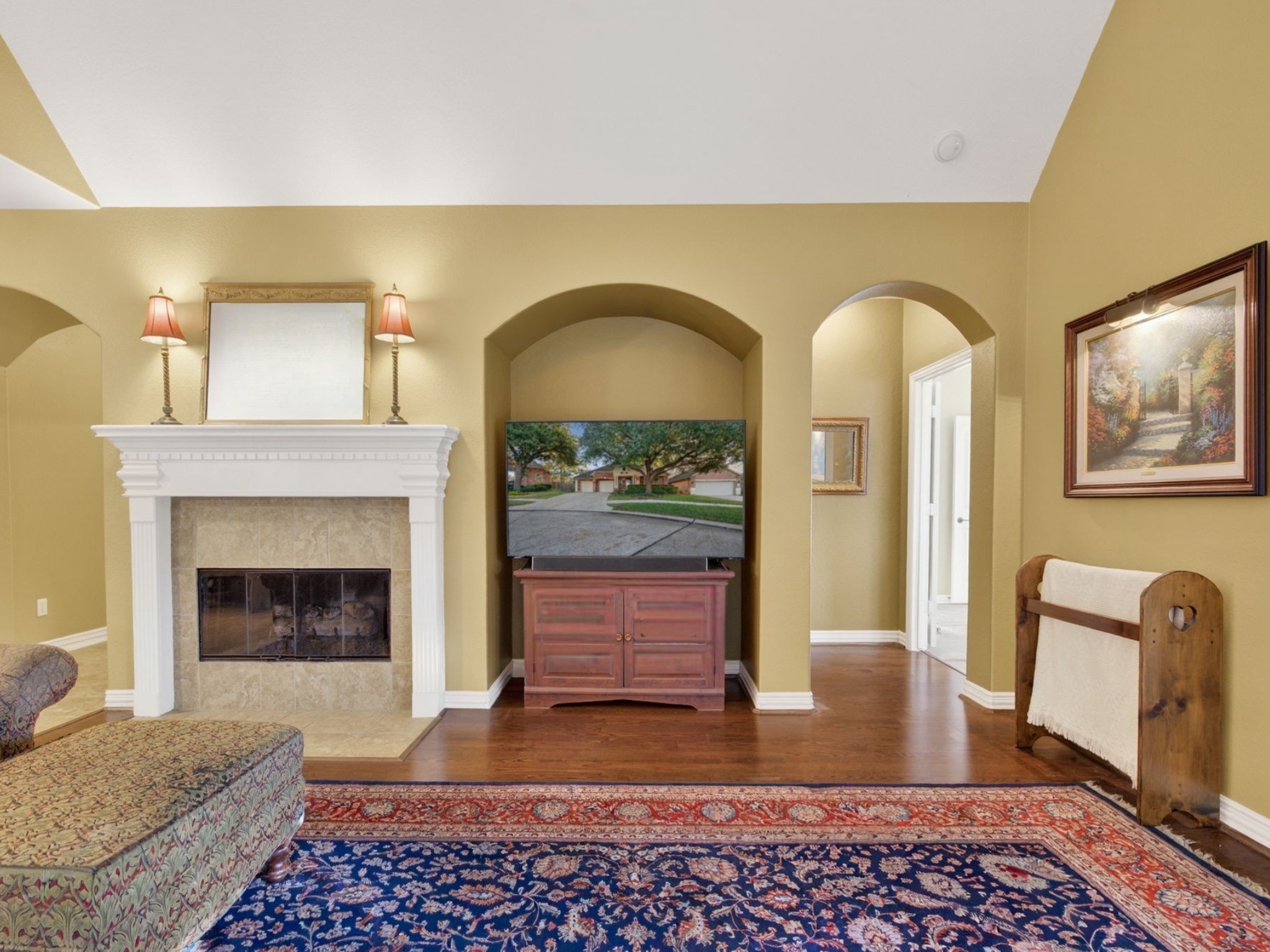 194 Maple Grove Drive Conroe, TX 77384 - Photo 11 of 25 a living room with furniture and a fireplace