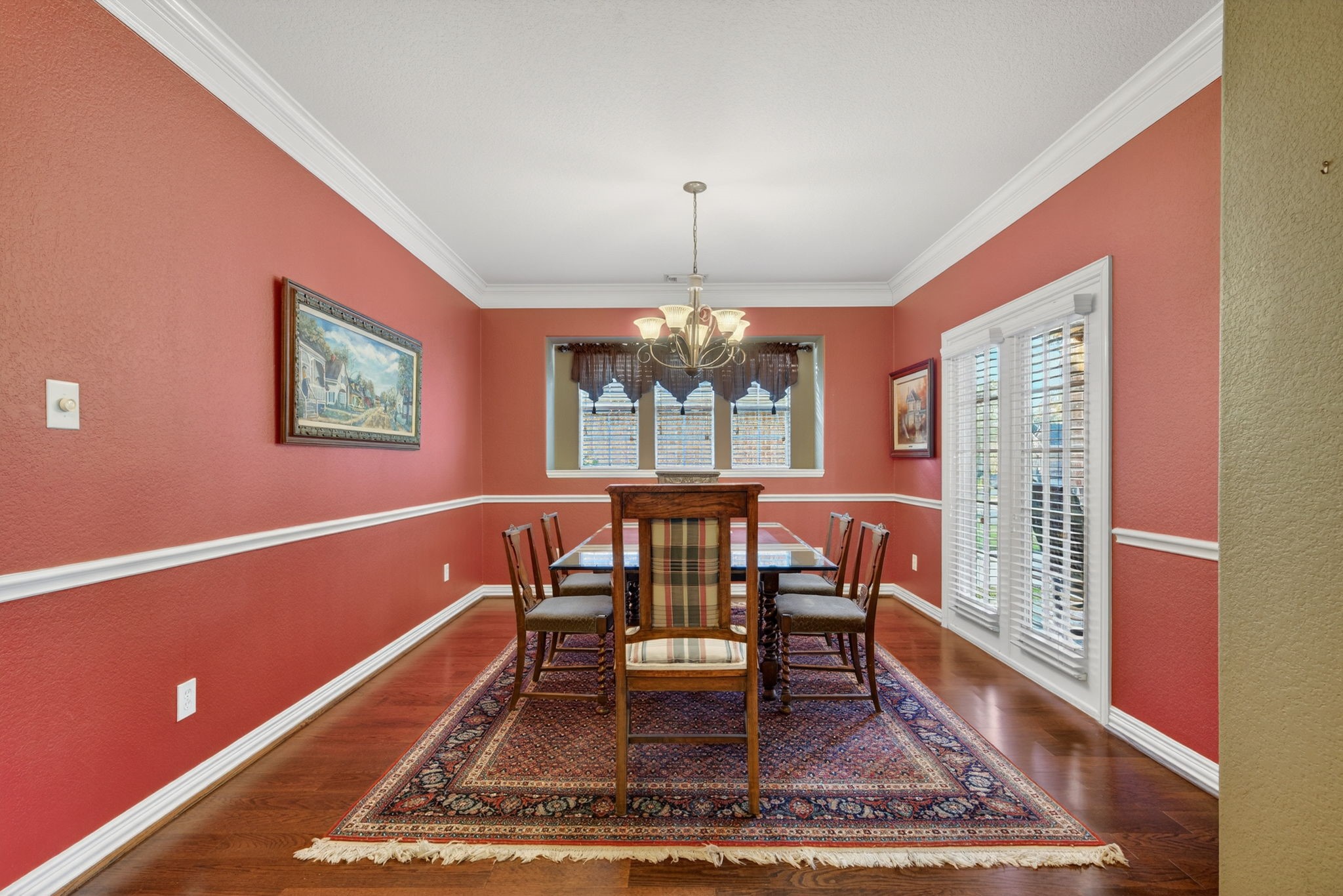 194 Maple Grove Drive Conroe, TX 77384 - Photo 5 of 25 a view of a dining room with furniture window and wooden floor