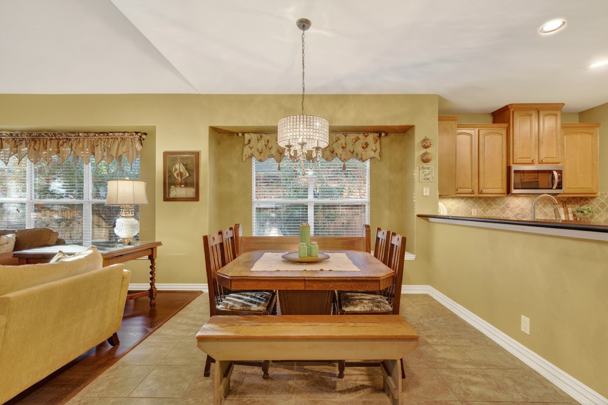 194 Maple Grove Drive Conroe, TX 77384 - Photo 8 of 25 a living room with furniture and a chandelier