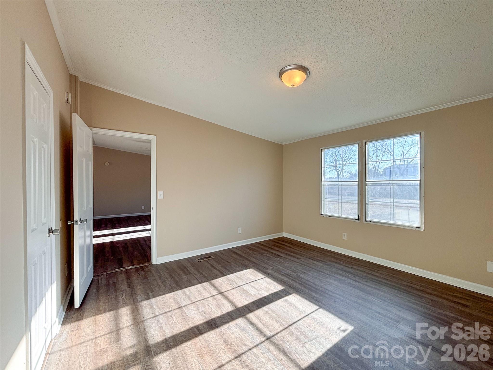 3596 Gull Street Hudson, NC 28638 - Photo 15 of 23 a view of an empty room with a window