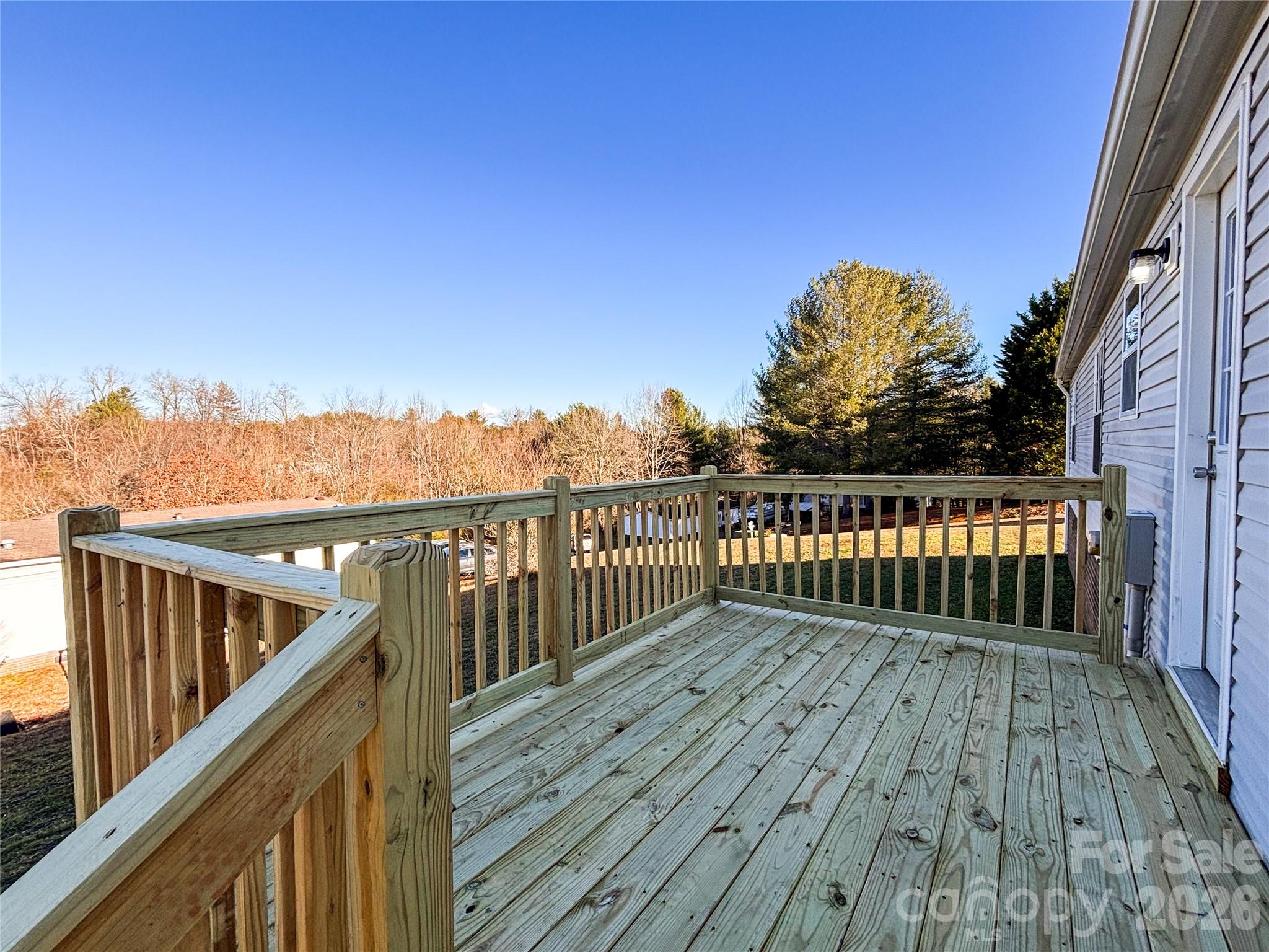 3596 Gull Street Hudson, NC 28638 - Photo 21 of 23 a view of deck with wooden floor and fence