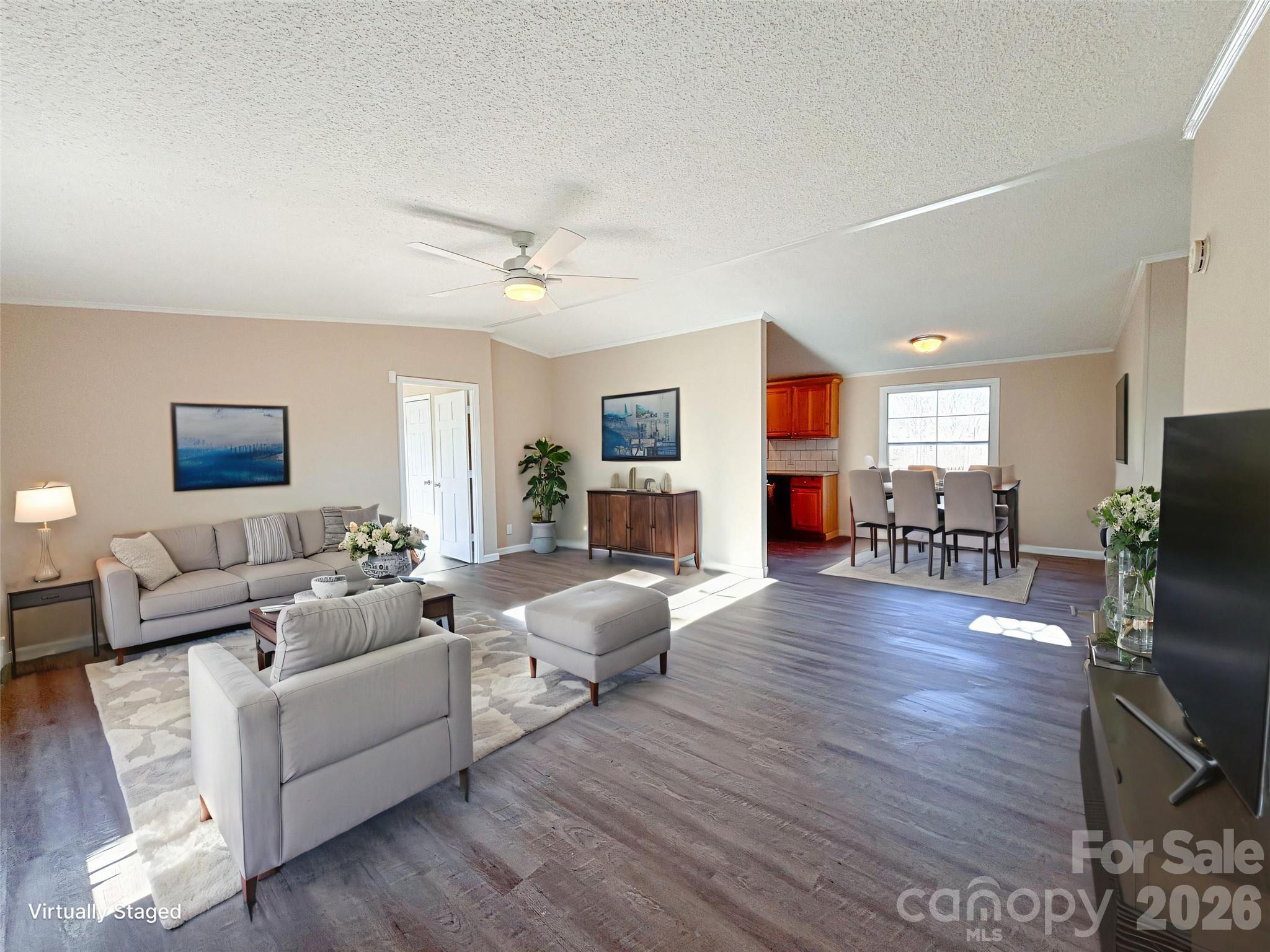 3596 Gull Street Hudson, NC 28638 - Photo 3 of 23 a living room with furniture and a wooden floor