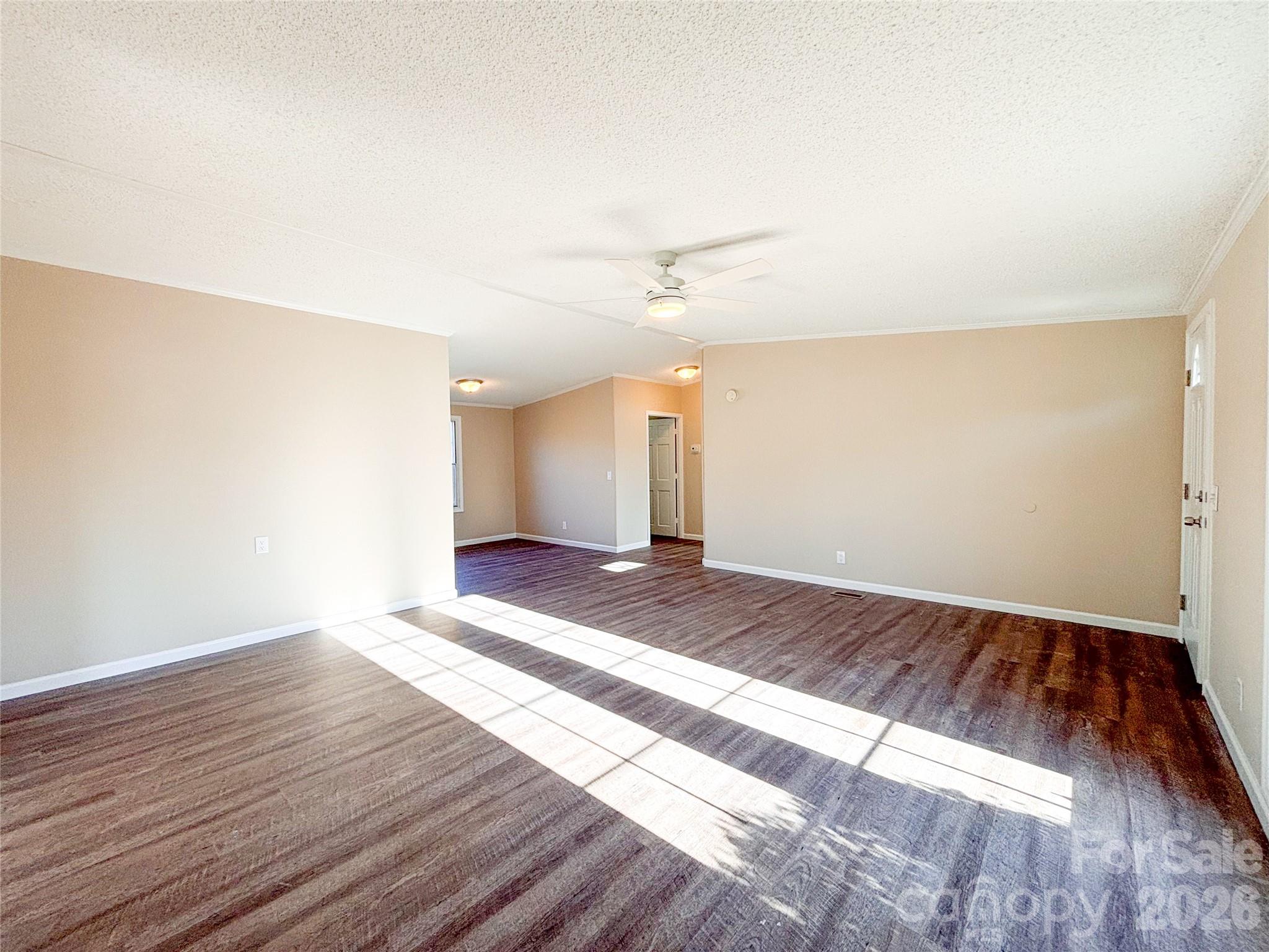 3596 Gull Street Hudson, NC 28638 - Photo 8 of 23 a view of an empty room and wooden floor