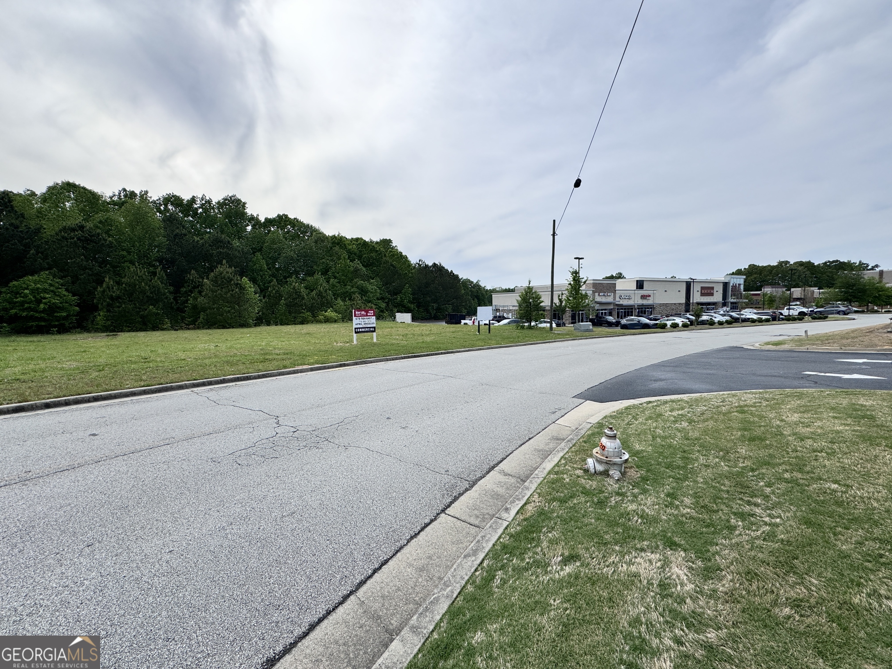 2342 Sparta Way Braselton, GA 30519 - Photo 20 of 25 a view of a golf course with car parked