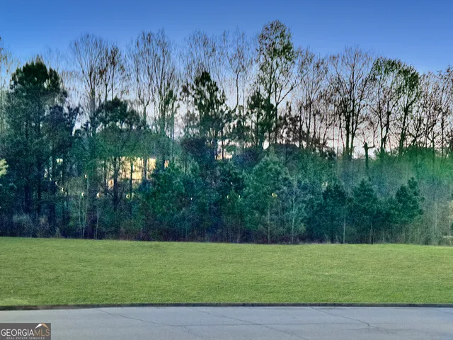 a view of swimming pool with an outdoor space and seating area