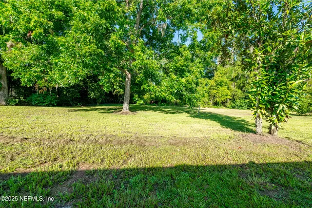 a view of an outdoor space and a yard