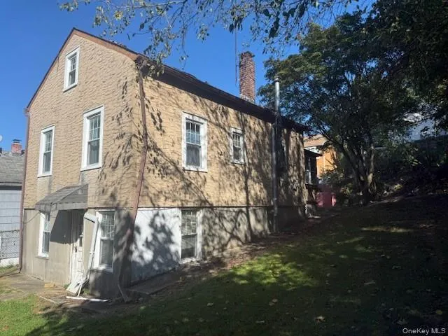 a view of a building with a yard