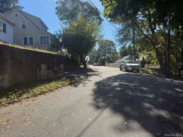 a view of a street with some trees