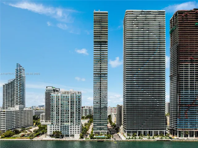 a view of a city with tall buildings