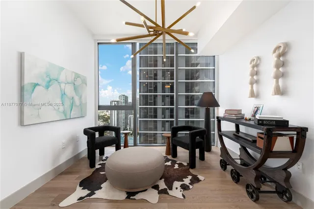 a workspace with furniture and a window