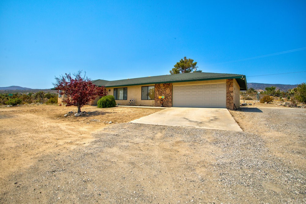 1707 Maria Road Pinon Hills, CA 92372 - Photo 1 of 1 a view of a house with a snow