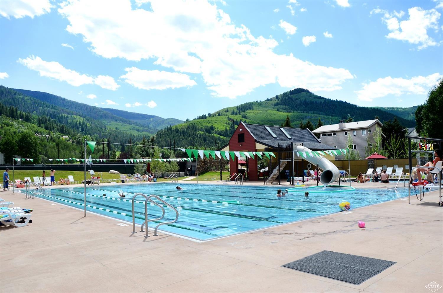 165 Gopher Road, Unit E28 Avon, CO 81620 - Photo 18 of 19 a view of a swimming pool and lounge chairs