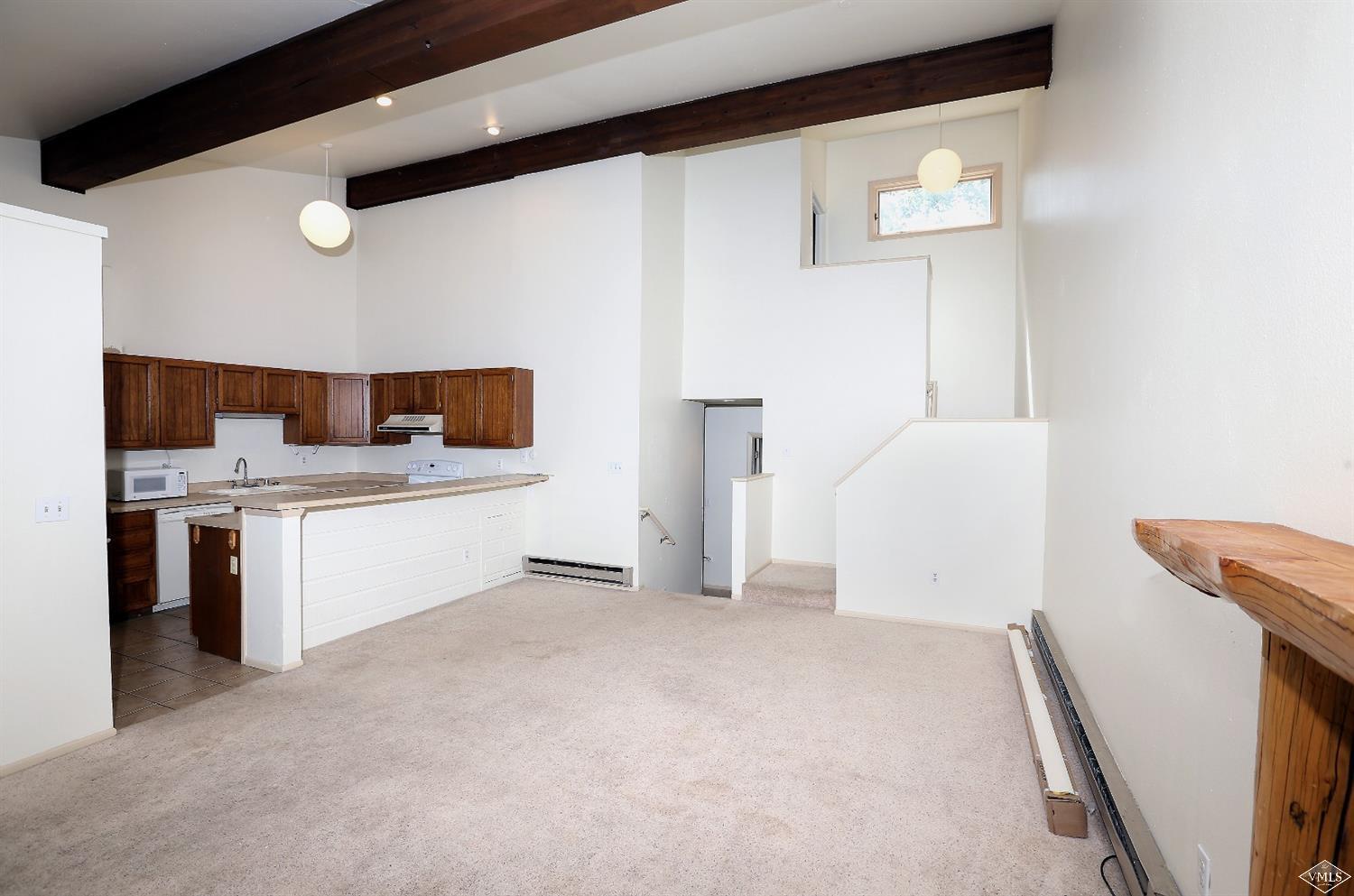 165 Gopher Road, Unit E28 Avon, CO 81620 - Photo 4 of 19 a view of a kitchen with a sink