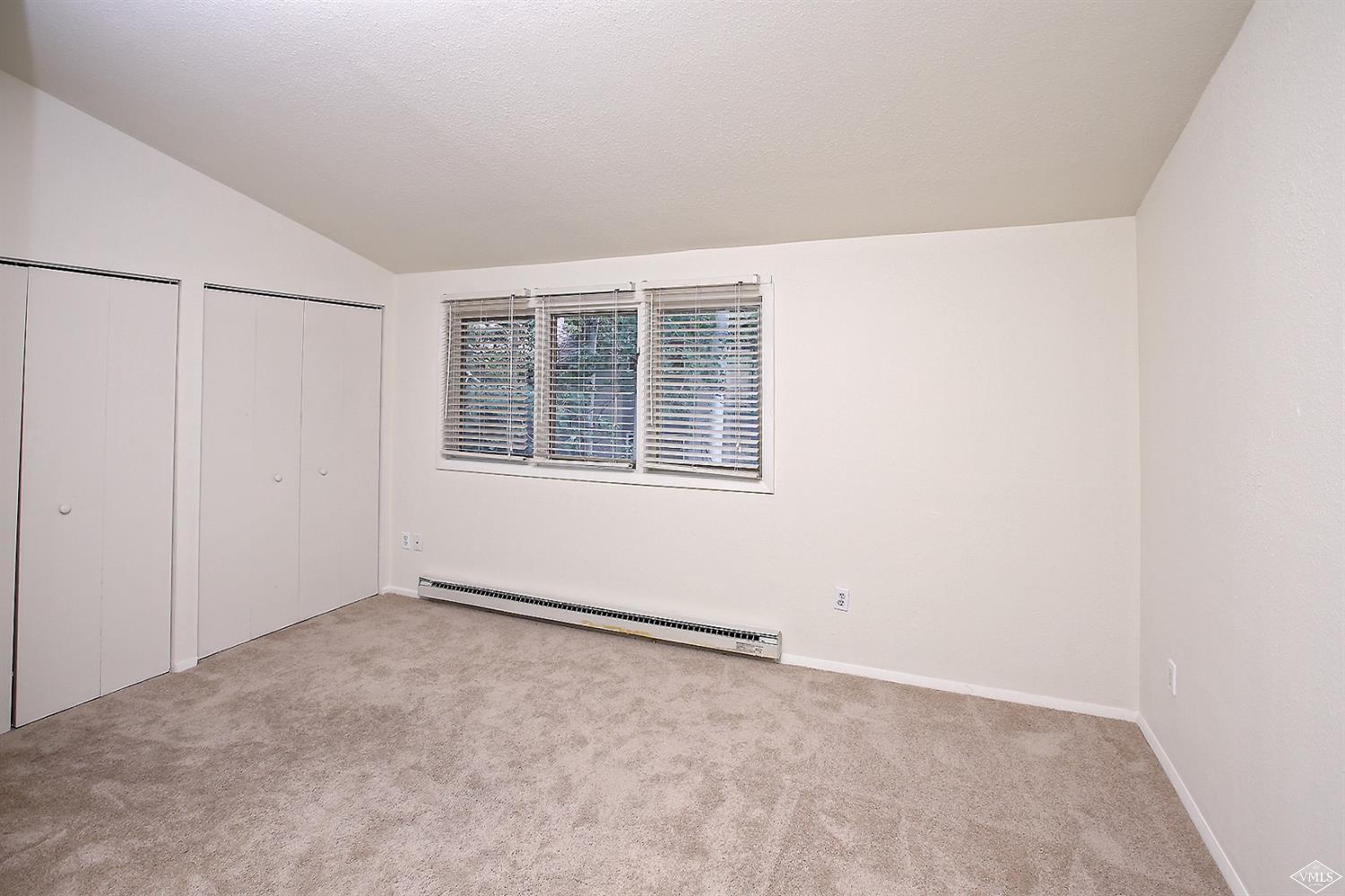 165 Gopher Road, Unit E28 Avon, CO 81620 - Photo 8 of 19 a view of an empty room with a window