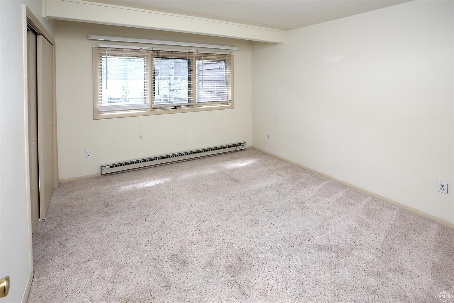 165 Gopher Road, Unit E28 Avon, CO 81620 - Photo 10 of 19 an empty room with a window