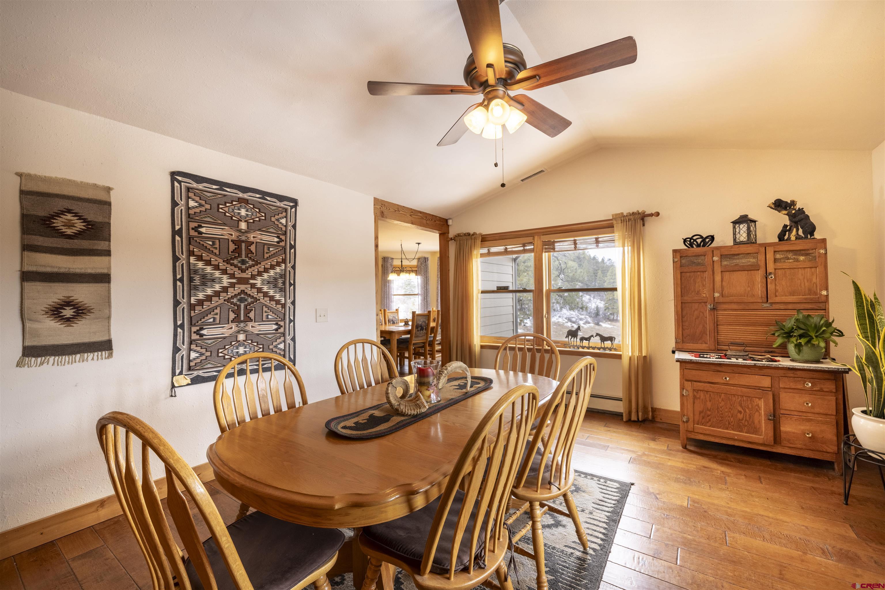 250 Sunset Lane Durango, CO 81301 - Photo 13 of 44 a view of a dining room with furniture window and outside view