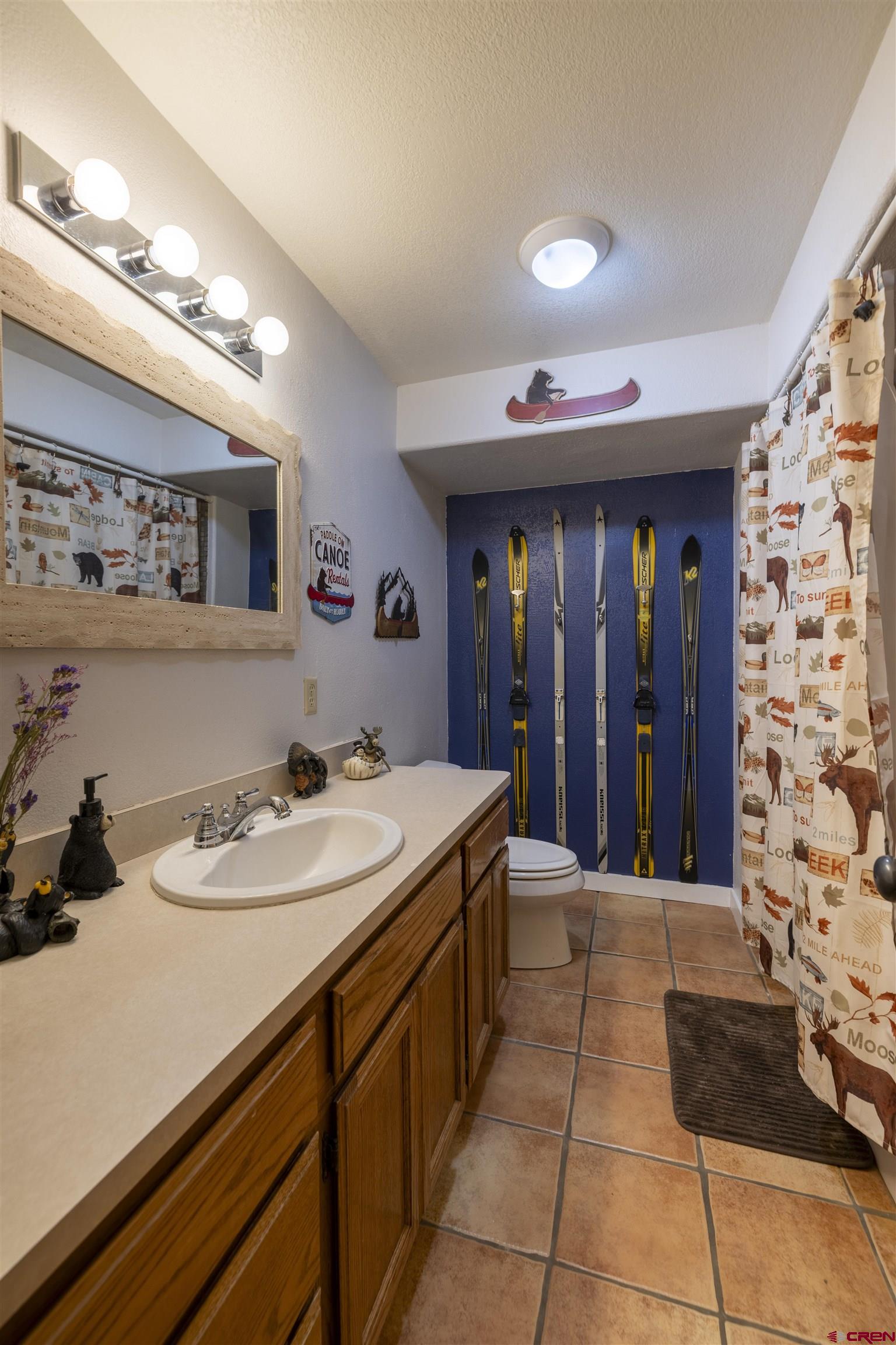 250 Sunset Lane Durango, CO 81301 - Photo 31 of 44 a bathroom with a sink and a mirror