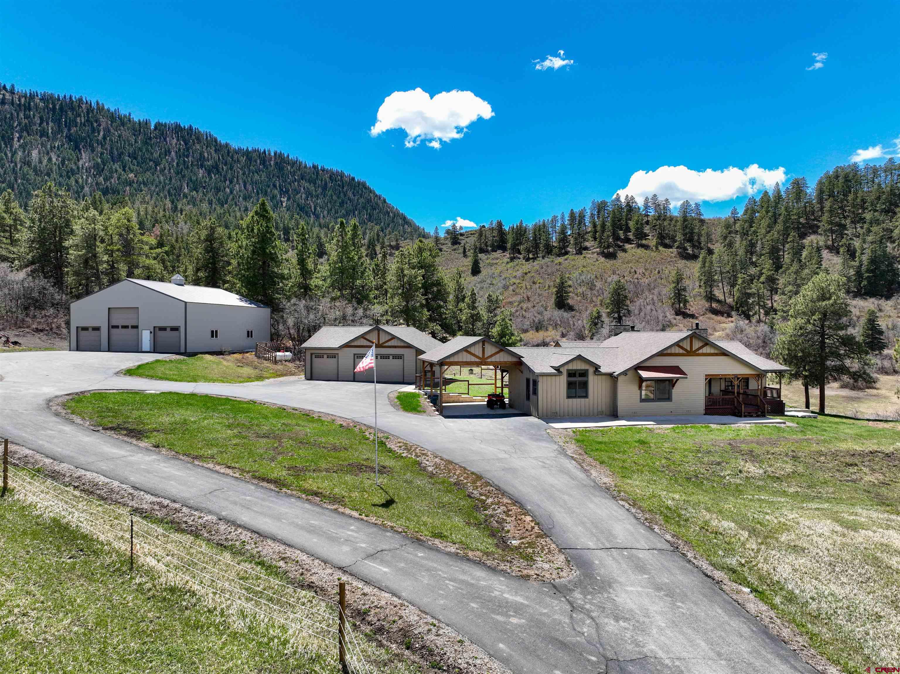 250 Sunset Lane Durango, CO 81301 - Photo 43 of 44 a front view of a house with garden