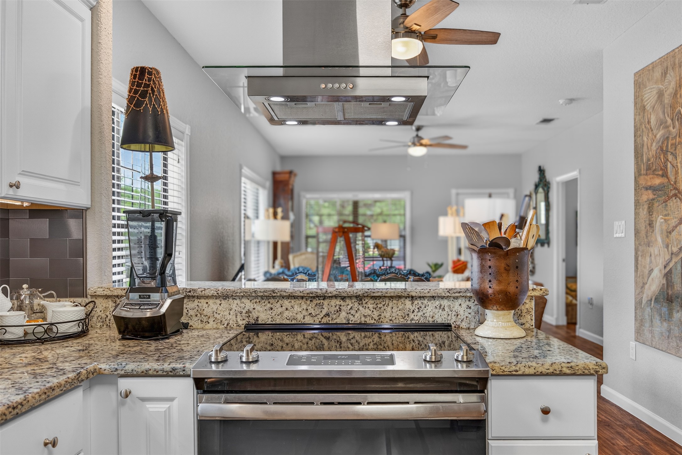 217 Walnut Avenue Luling, TX 78648 - Photo 13 of 38 a kitchen with a stove and a granite counter tops