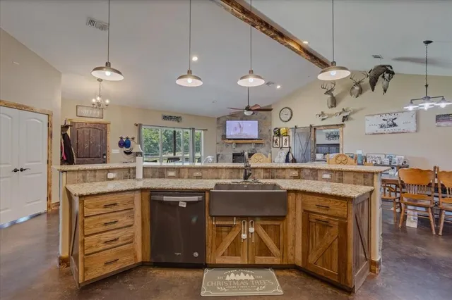 a kitchen with lots of counter space and a sink