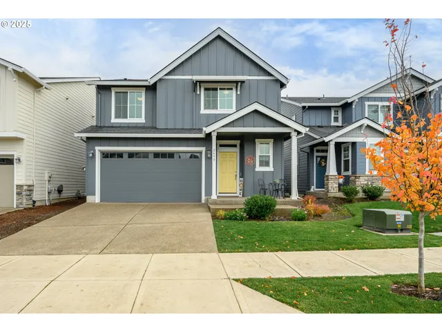 a large kitchen with stainless steel appliances granite countertop a stove oven and a sink