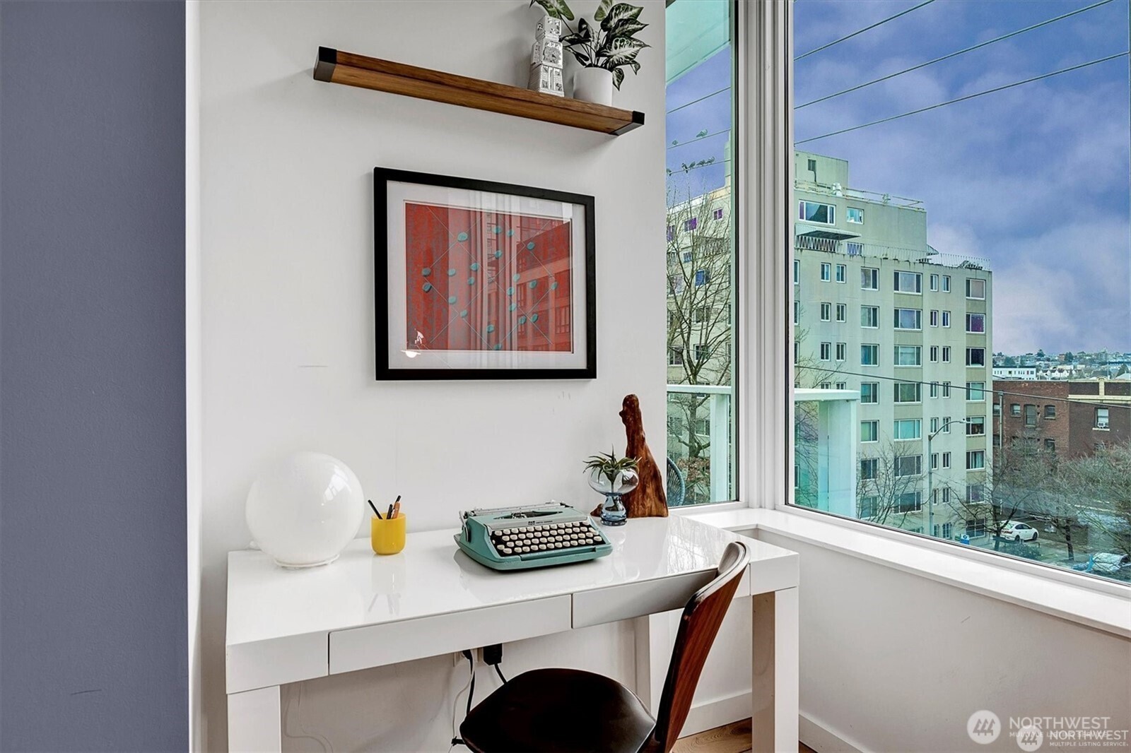 1321 Seneca Street, Unit 401 Seattle, WA 98101 - Photo 13 of 39 a view of a dining room with furniture and window