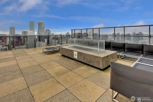 a outdoor space with lots of tables and chairs