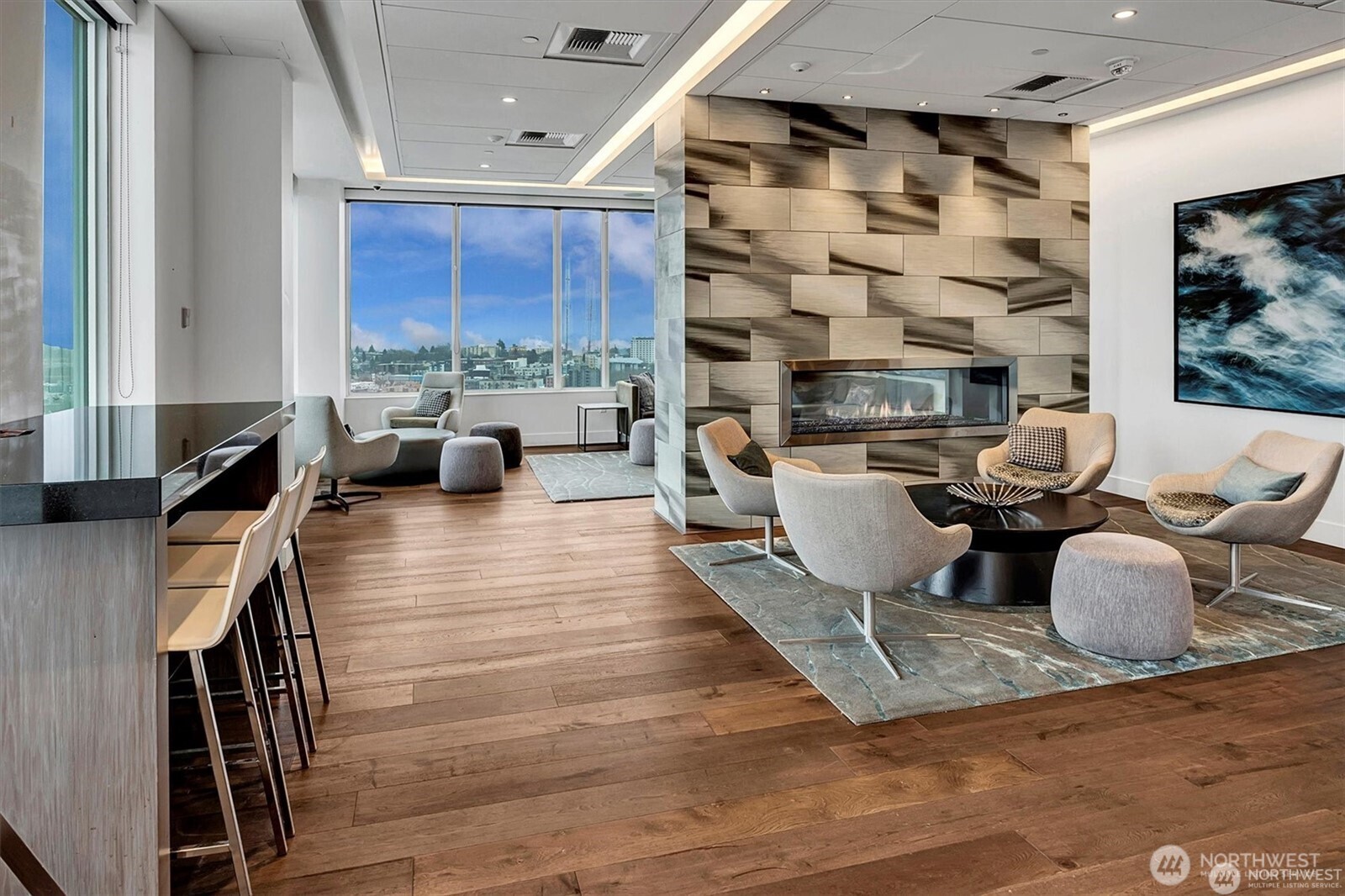 1321 Seneca Street, Unit 401 Seattle, WA 98101 - Photo 33 of 39 a living room with furniture and a fireplace