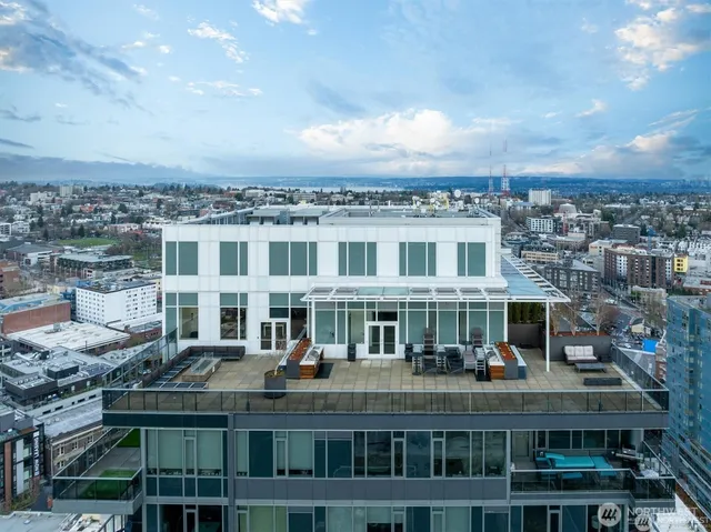 a view of a large building with a lot of trees