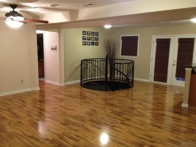 a view of livingroom with furniture and windows