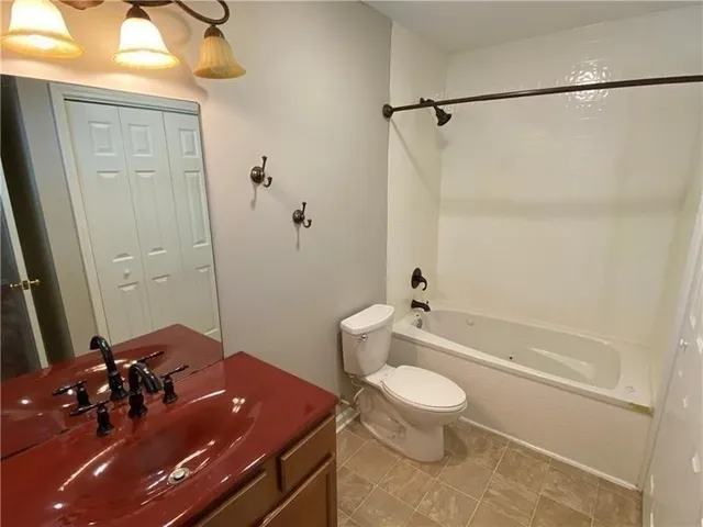 a living room with furniture a window and a piano