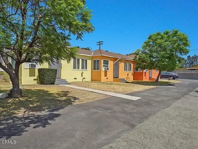a front view of a house with a garage