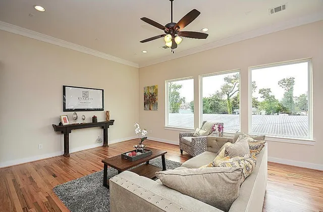 a living room with furniture and a window