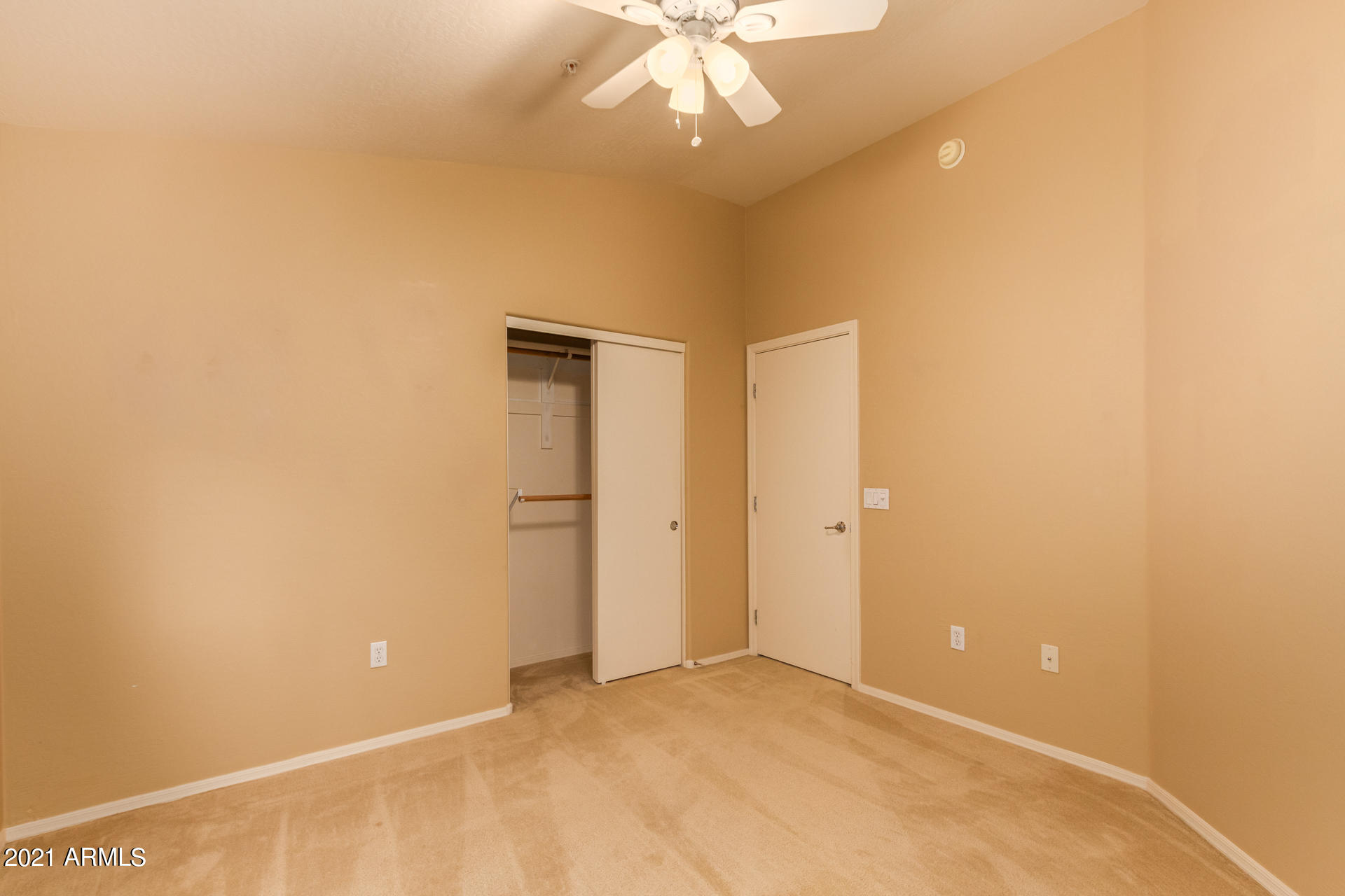 2150 East Bell Road, Unit 1162 Phoenix, AZ 85022 - Photo 17 of 24 a view of an empty room with a window