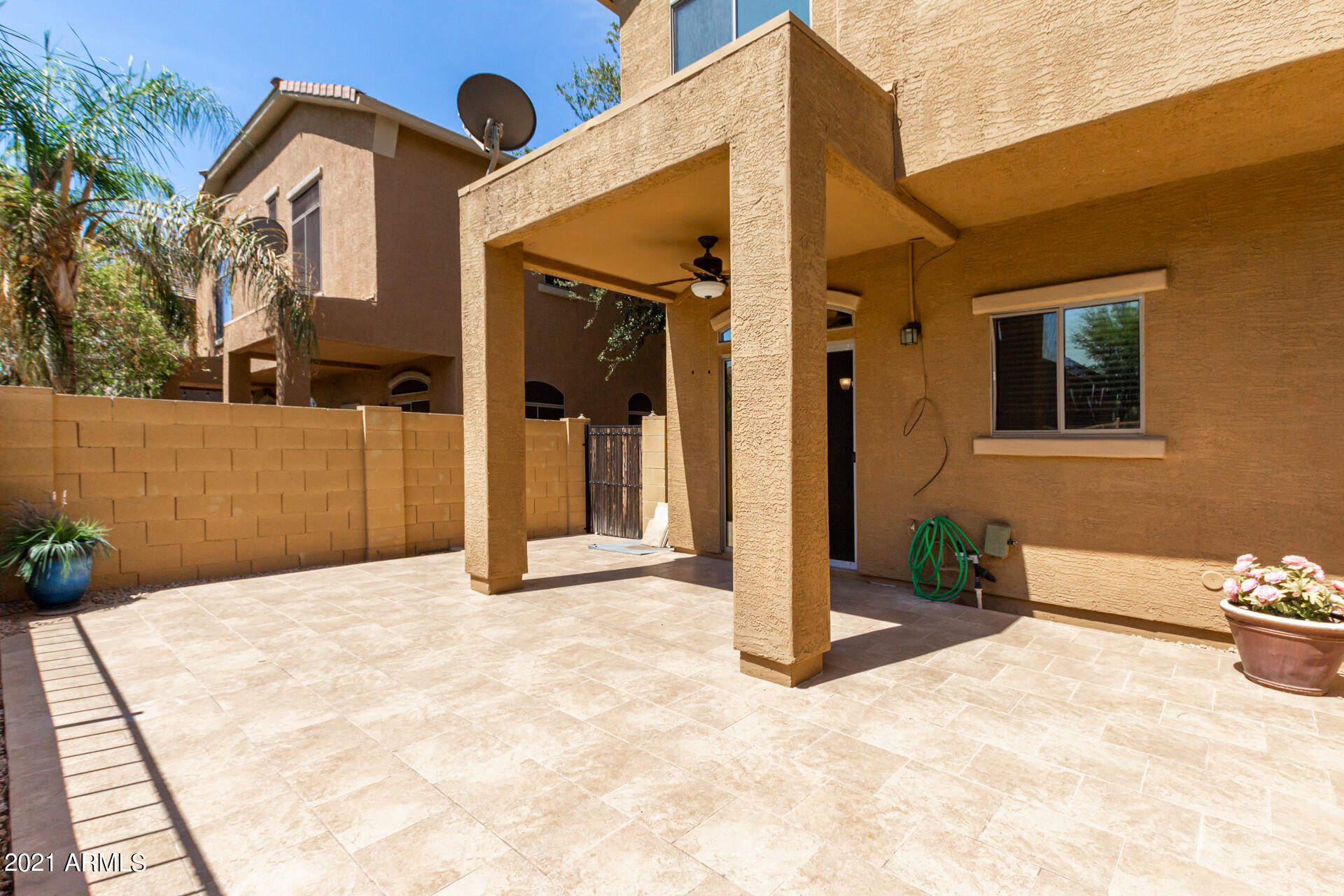 2150 East Bell Road, Unit 1162 Phoenix, AZ 85022 - Photo 23 of 24 a front view of a house with a yard