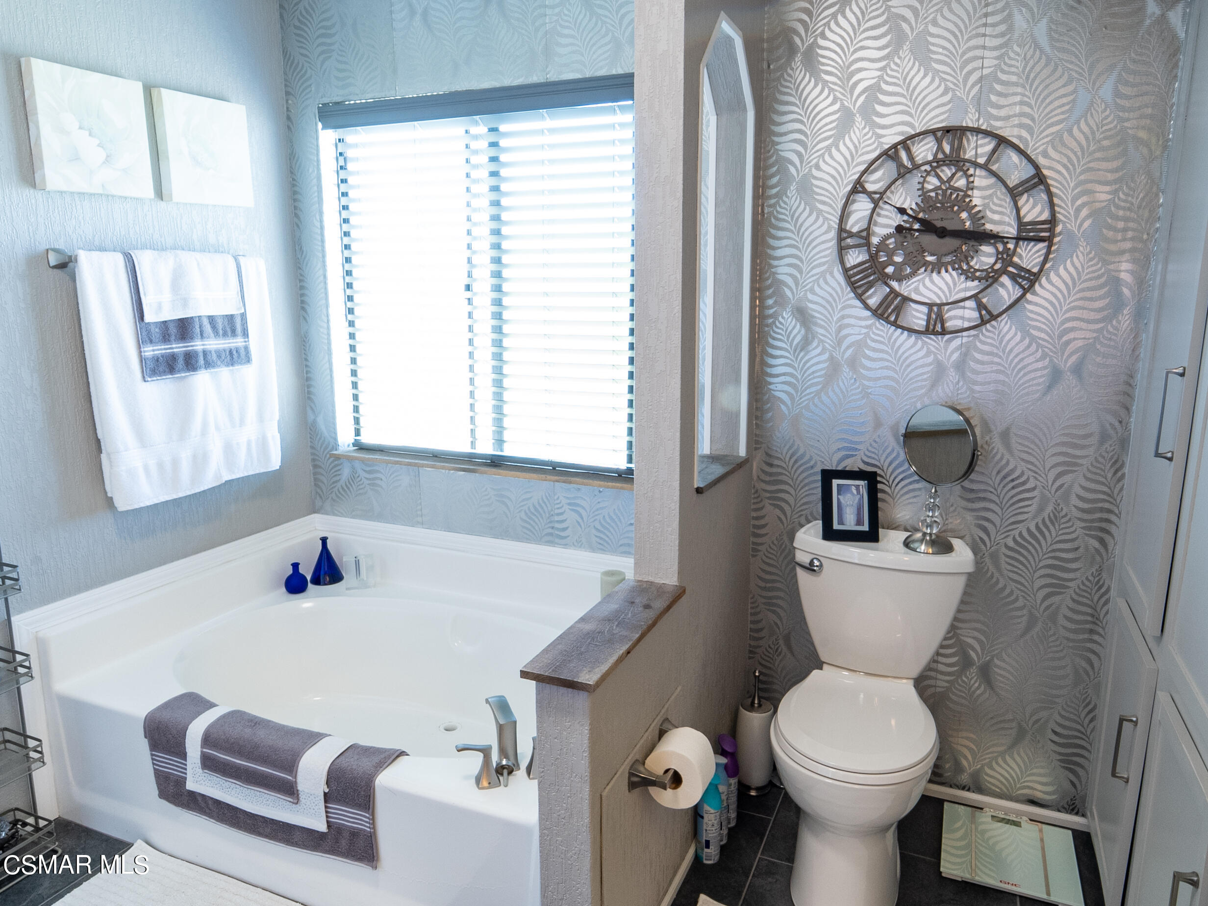 2501 Dogwood Drive, Unit 77 Oxnard, CA 93036 - Photo 17 of 32 a bathroom with a sink toilet and a window