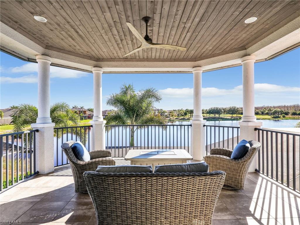 12757 Dundee Lane Naples, FL 34120 - Photo 28 of 48 a balcony with furniture and garden view