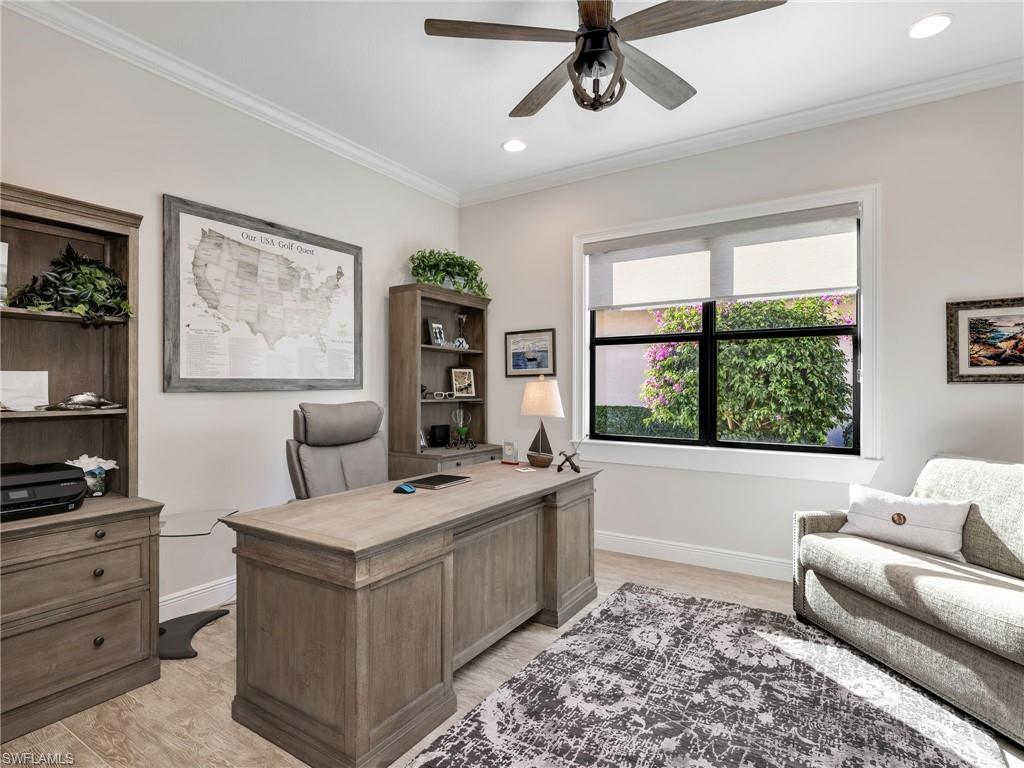 12757 Dundee Lane Naples, FL 34120 - Photo 29 of 48 a living room with furniture and a window