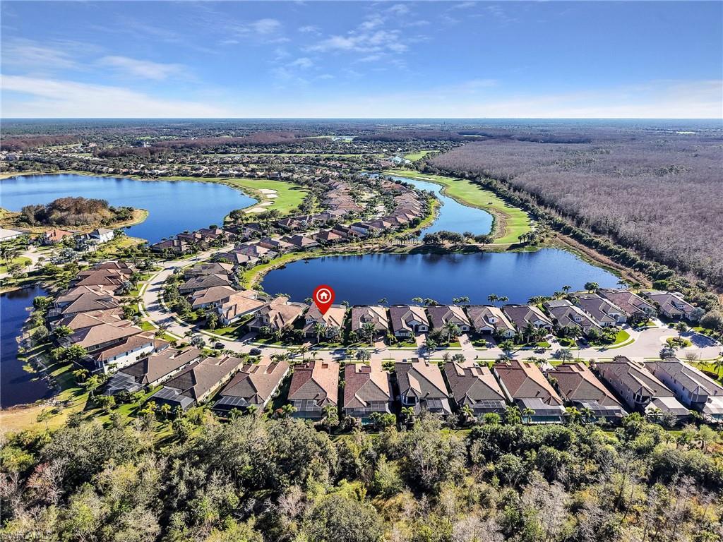 12757 Dundee Lane Naples, FL 34120 - Photo 42 of 48 an aerial view of a house with a garden