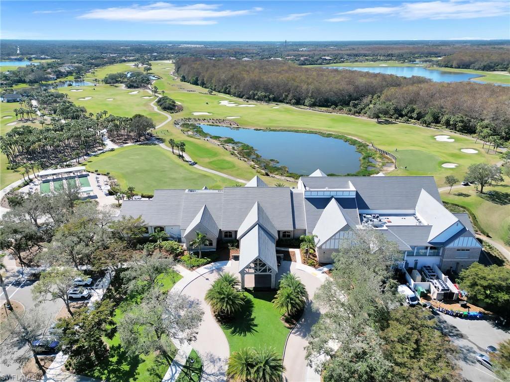 12757 Dundee Lane Naples, FL 34120 - Photo 46 of 48 an aerial view of residential houses with outdoor space and river