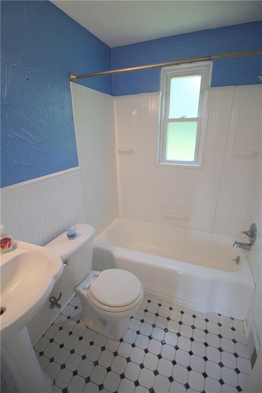 87 Ruthfred Drive Upper St. Clair, PA 15241 - Photo 13 of 21 Updated main bath with pedestal sink, wainscoting, and bath surround.