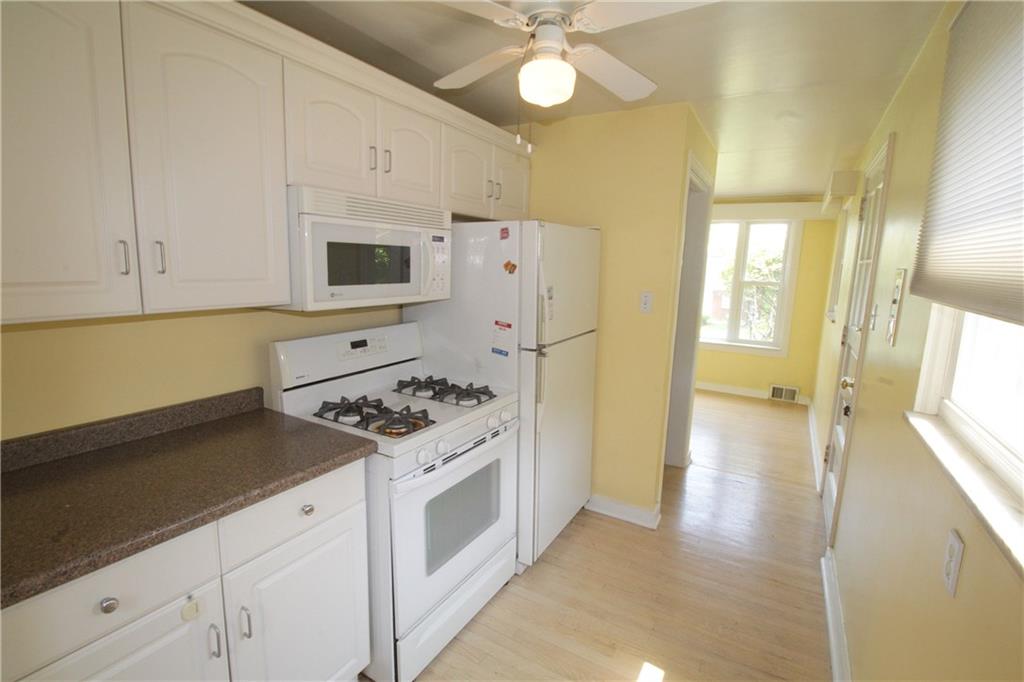 87 Ruthfred Drive Upper St. Clair, PA 15241 - Photo 8 of 21 The kitchen comes fully equipped with the gas stove, refrigerator, microwave, and dishwasher.